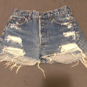 Levi high waisted button fly distressed shorts